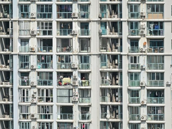Chine: la flambée Omicron, Shanghai au balcon